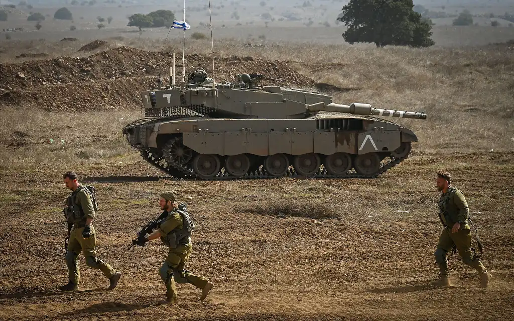 Israel agrees to delay Gaza invasion