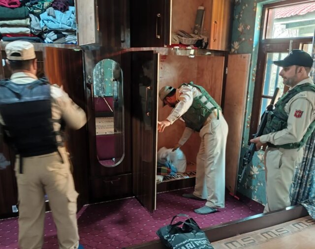 Police raid residences of terrorist associates linked to banned organisations Police raid residences of terrorist associates linked to banned organisations in Srinagar